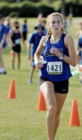 Ginger Schulte places first at cross country meet