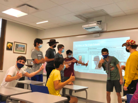 A group of history club members present at a club meeting. Students can expect this at a typical history club meetings. We have small lectures and often have fun activities revolving World History, president Tenny Dibooglu said.