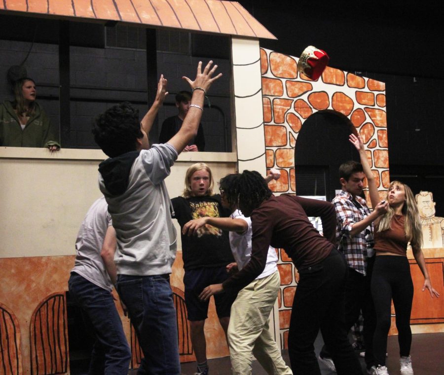 The cast of the LHWHS fall play, The Complete Works of William Shakespeare, Abridged, rehearses a scene on Oct. 4, 2022.  Its really clear that everyone whos participating had put so much effort into everything, and its going to make this years show super amazing, said props director sophomore Ashley Gray. 
