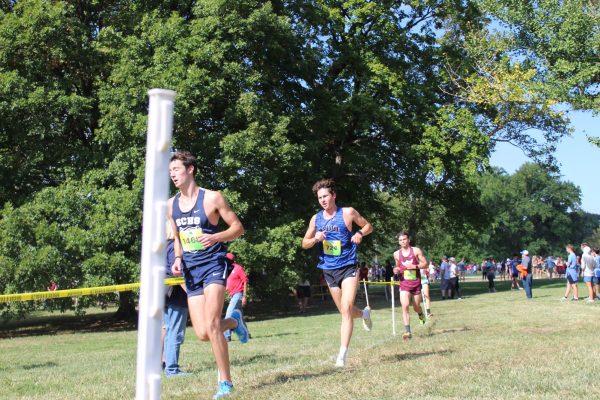 Nicholas Raibley (12) runs in the varsity boys race at the Forest Park Cross Country Festival Sept. 9th. He was the first runner from Ladue to finish the varsity boys race. Ladue’s varsity boys team finished 10th out of more than 30 varsity teams.