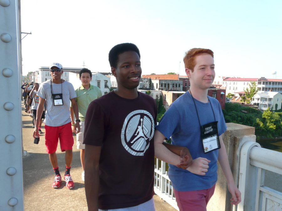 Class 11 of Cultural Leadership walks across the Edmund Pettus Bridge which was the same place that African Americans protested for voting rights during the Civil Rights movement. 