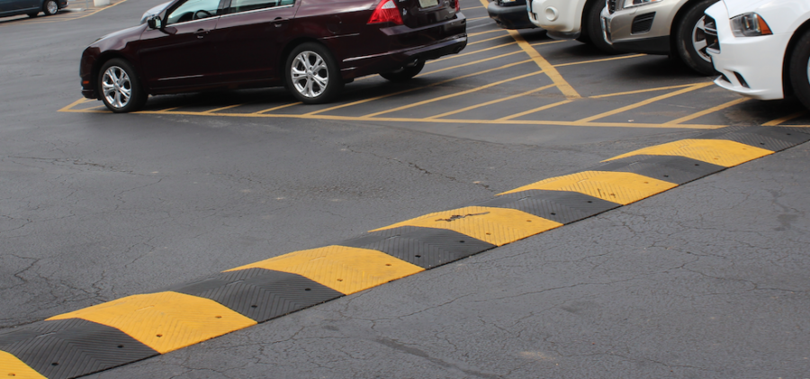 Speed bumps were added to keep the parking lot safe. 