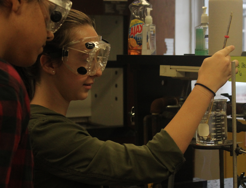 Sophomore Abigail yearout works on a project in science class. 