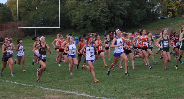 Junior Lila Bensky leads the pack at the beginning of the race. 