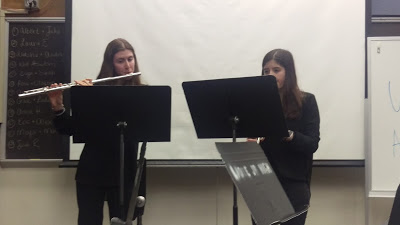 Seniors Sarah Eisenman and Evyn Levy play the flute and clarinet, respectively, at the 2017 Play It Forward benefit concert. Tri-M has held this concert every year to help student musicians in need. It would be amazing if the Ladue community could come together and donate to this awesome cause. Eisenman said.