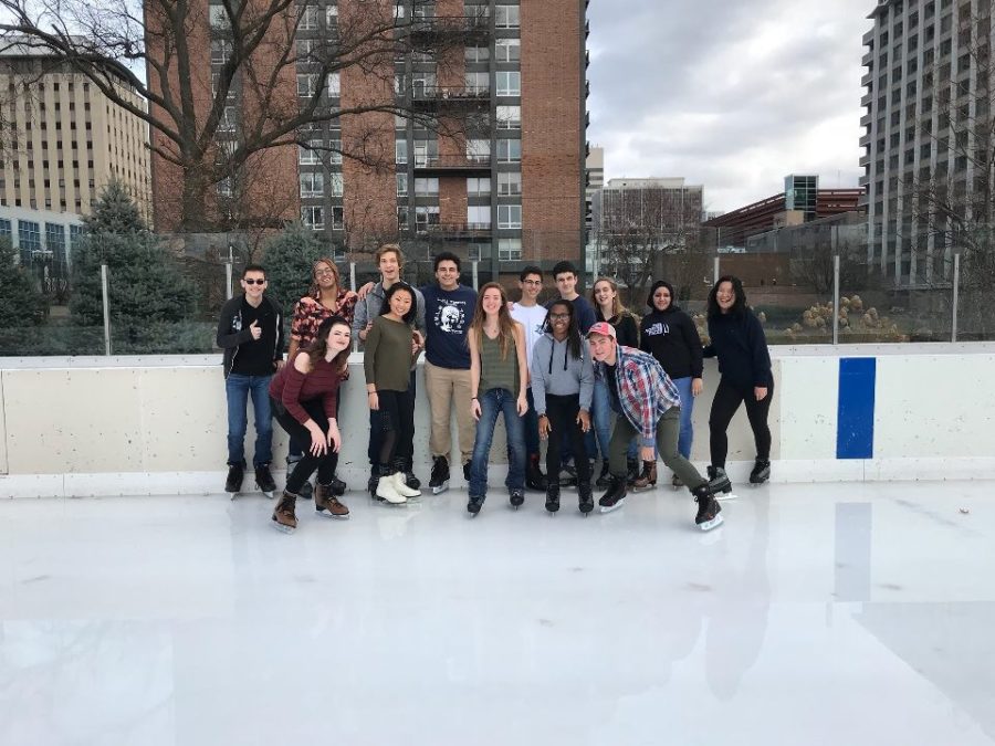 Posing for a troupe picture before skating off on the ice, Ladue thespians engage in a team bonding activity in order to increase the feeling of community in the troupe.