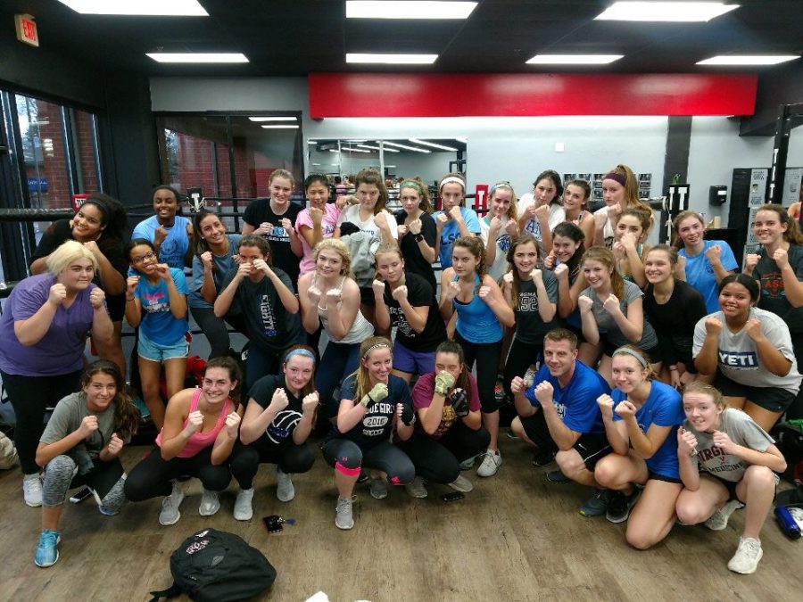 The Ladue Girls’ Soccer team poses for a photo after one of their Title Boxing sessions. The team works out on Tuesdays and Thursdays after school. “We are not getting touches on the ball, [but] we get a full body workout [that] make[s] us stronger.” captain Sarah Cook said.
