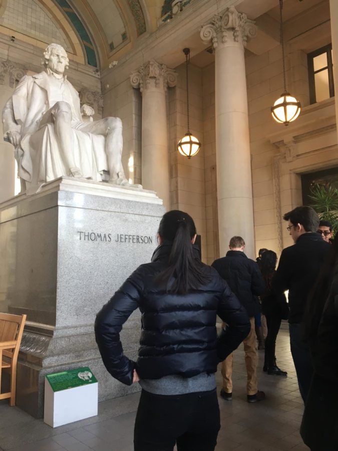 APUSH students stand in front of the statue of Thomas Jefferson as they enter the Missouri History Museum. They went to the museum to see the exhibit on the 1904 Worlds Fair. There were a variety of primary documents that were about a century old, senior Kalkidan Tadesse said. 