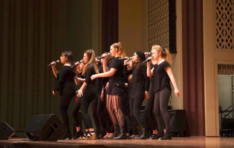 Kefalov, pictured second and in front from the left, sings with Viva Voce at the ICHSA Midwest quarterfinals on Feb. 4. Kefalov was nominated as the Most Outstanding Soloist for her performance in the piece, “When We Were Young” by Adele. “My favorite part about performing is really connecting with an audience and being myself on stage,” Kefalov said. “I also love the adrenaline boost I get when Im standing in front of people and getting ready to sing.”