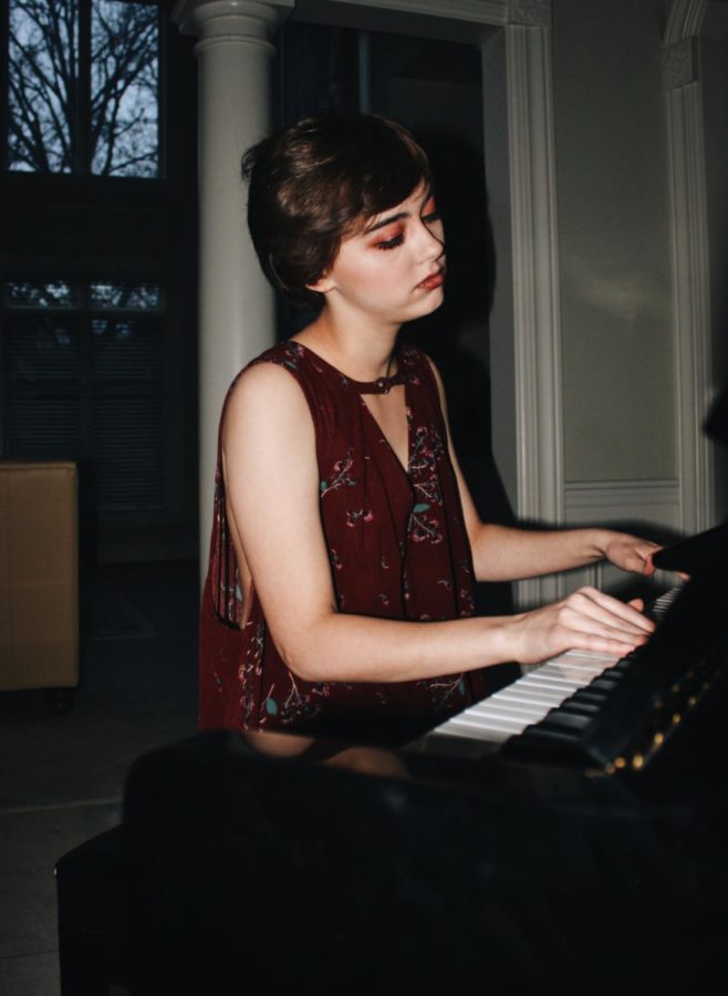 Sophomore Madeline Stoces sits at a piano playing music for her screenplay. “Sometimes I’ll get a tune in my head and the rest will come,” Stoces said. Makeup and Styling by Sunny Lu