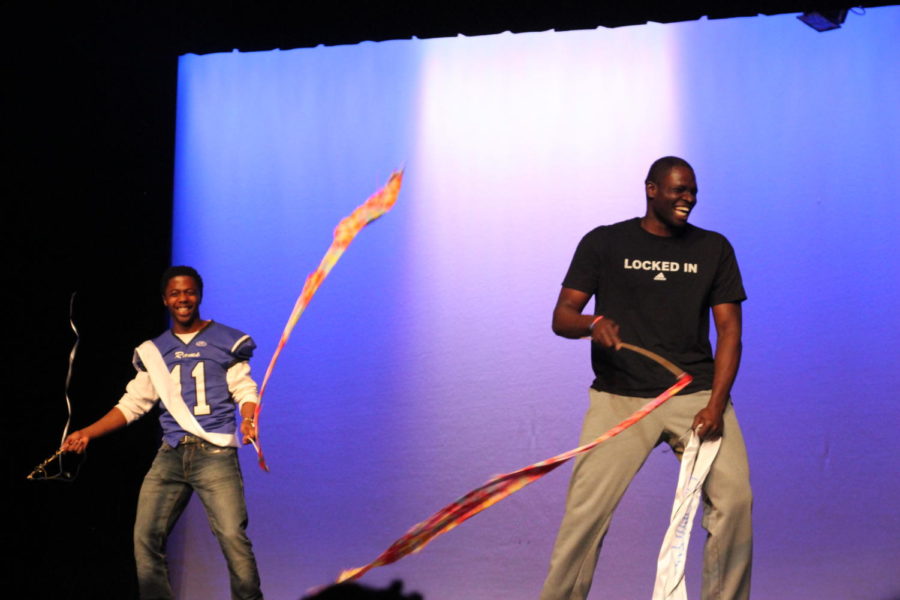 Habitat for Humanity hosted their seventh annual Mr. Ladue contest on March 13th. Senior Jordan Jackson (Left) and Junior Moses Okpala (right) twirl ribbons during the battle round.