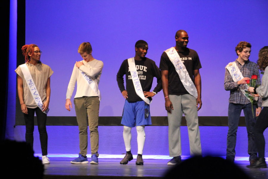 Habitat for Humanity hosted their seventh annual Mr. Ladue contest on March 13th. The five semi-finalists proudly stand and wait for the announcement of their final task.