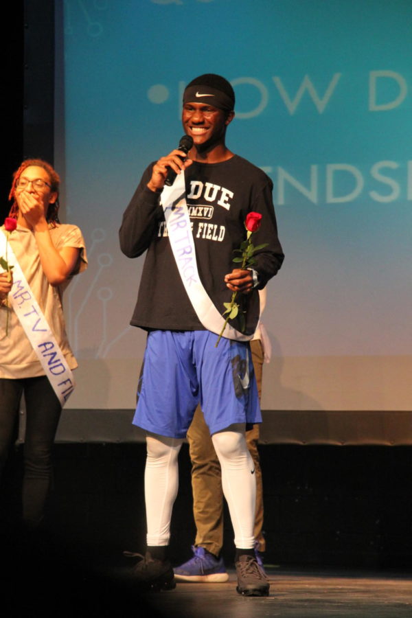 Habitat for Humanity hosted their seventh annual Mr. Ladue contest on March 13th. Semi-finalist Dale Chesson (11) smiles as he responds to his last question.