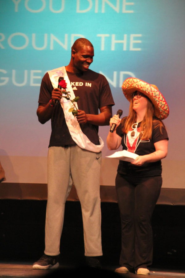 Habitat for Humanity hosted their seventh annual Mr. Ladue contest on March 13th. Junior Moses Okpala answers his final question.
