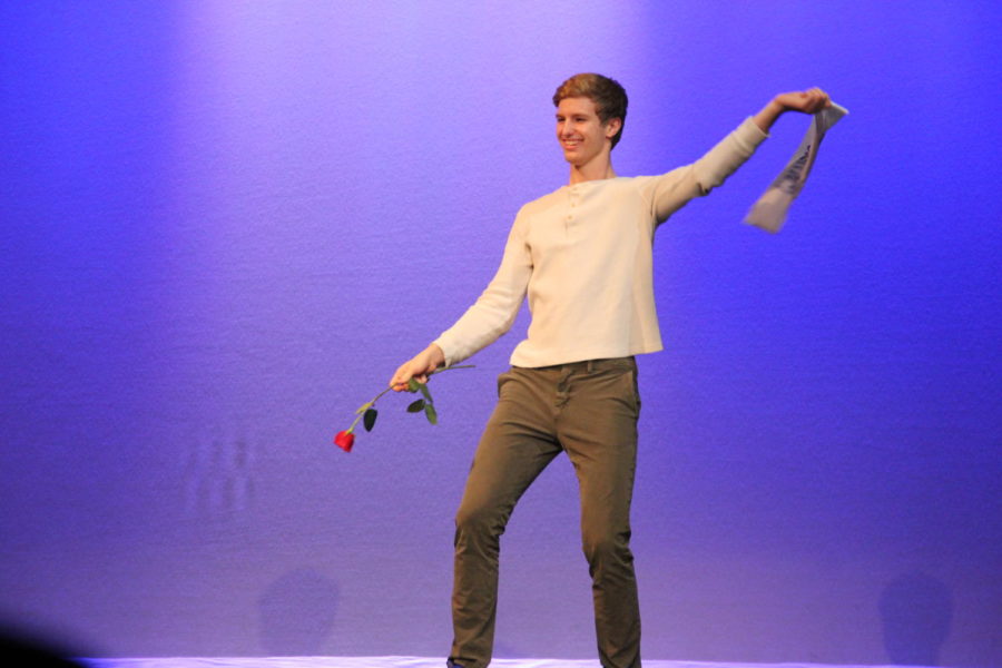 Habitat for Humanity hosted their seventh annual Mr. Ladue contest on March 13th. Senior Reid Rogers takes off his sash as he dances.