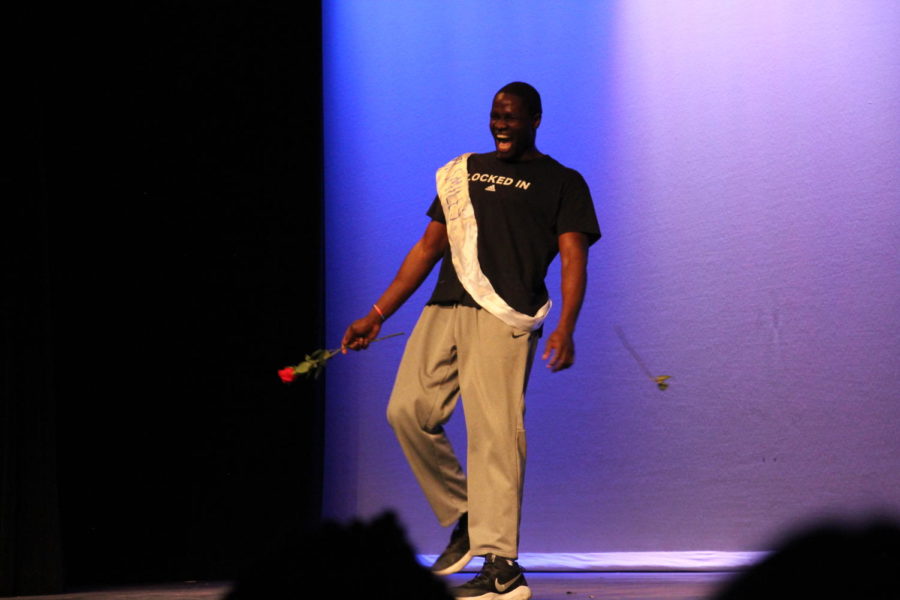 Habitat for Humanity hosted their seventh annual Mr. Ladue contest on March 13th. Junior Moses Okpala laughs as he performs during the lip sync battle.