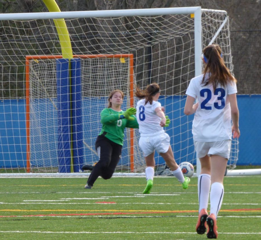 On 4/11, the JV Girls Soccer team played Webster Groves High School in a home game. Sophomore, Taylor Ott, makes a shot at the goal.