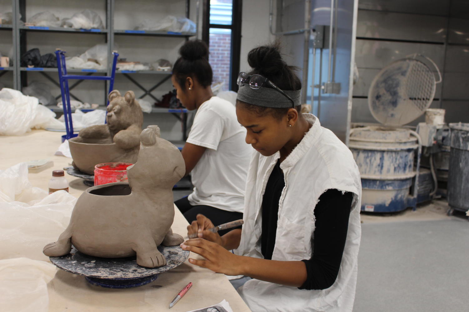 9/27 Ceramics II Works on Planter Projects