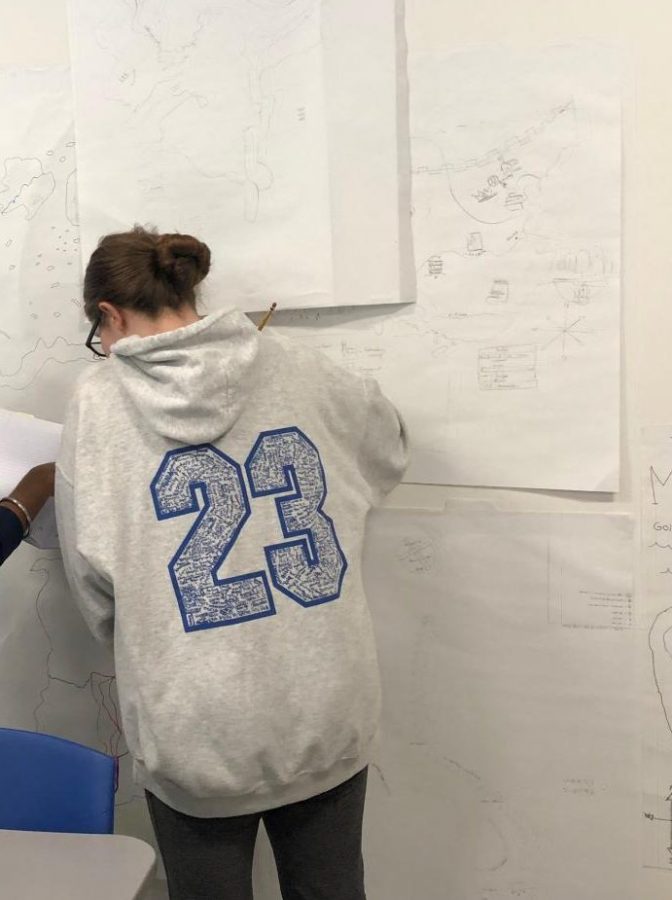 Alexis Monsey (9) works on her map during freshman World Studies. The class was learning about the eight specific features of civilizations. I was labeling and drawing a map of European civilizations, Monsey said. 