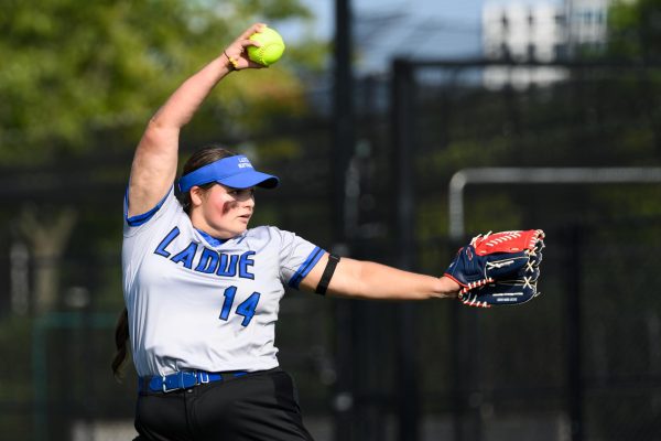 Sabra Fink (10) pitches during a softball game at Clayton High School August 29. Fink secured five strikeouts in four innings, helping the Rams to an 18-9 victory over the Greyhounds.