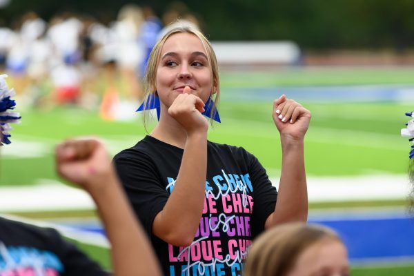 Sophomore All-American cheerleader Evelyn Barcz (10) cheers at Ladue Night Lights Sept. 20. The event featured a football game and a halftime performance  imitating a regular Friday Night Lights. “Being an All-American means showing the hard work and spirit throughout  school,” Barcz said. 
