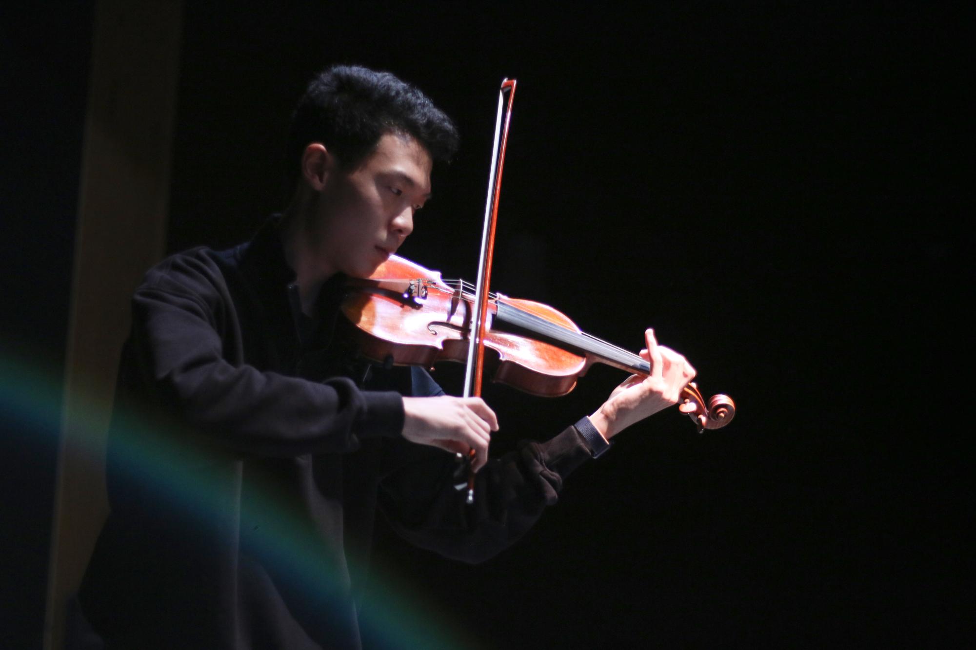 Junior Adam Ye performs the violin in the Performing Arts Center. He has practiced and performed in many orchestras, including the St. Louis Symphony Youth Orchestra, Community Music School’s Preparatory Program, and the Missouri All-State Orchestra. Through his numerous performances, Ye has found an outlet for self expression through the violin. “The instrument shouldnt be a prison,” Ye said. “It should be a key, a tool for you to explore yourself.”