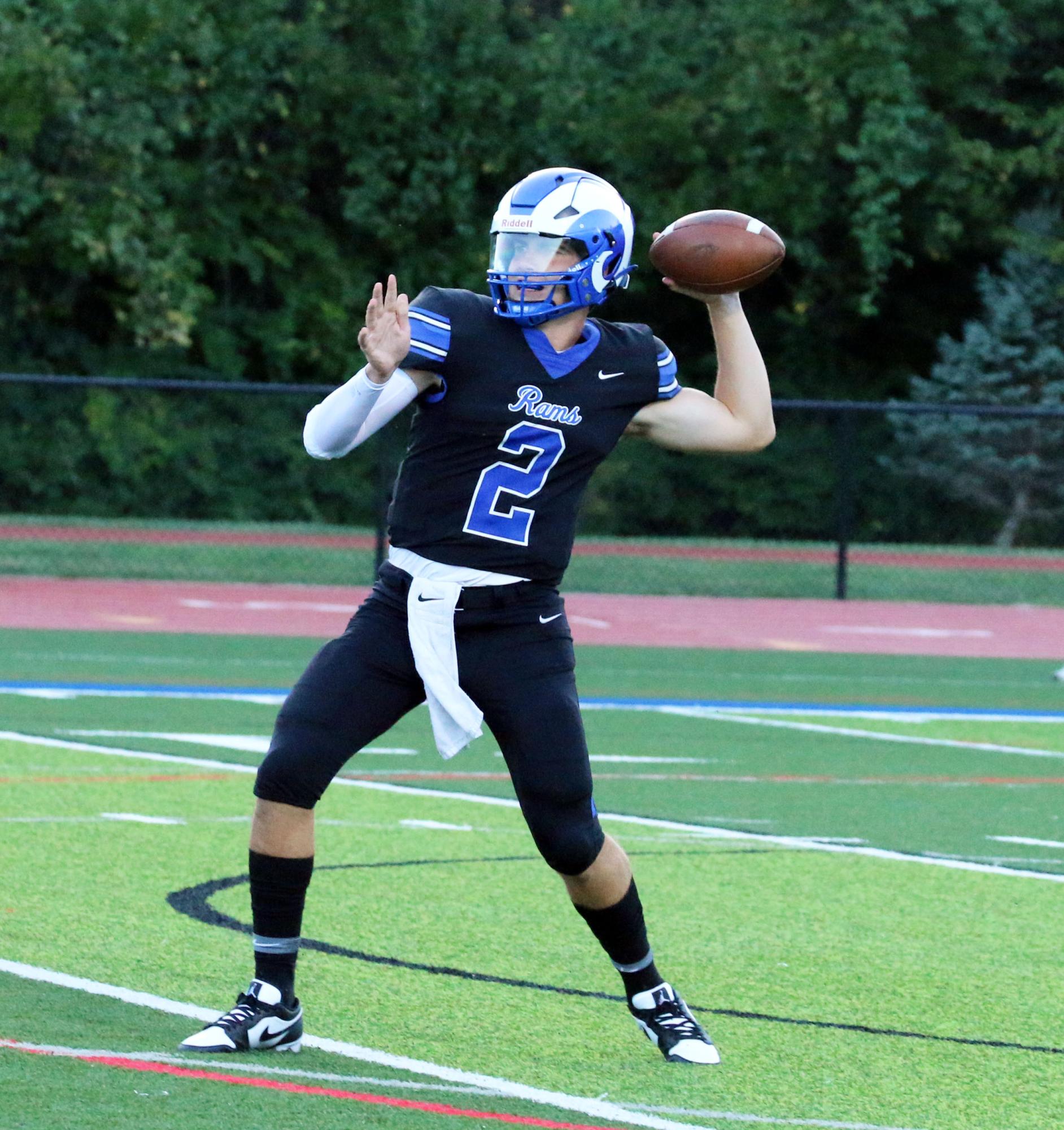 Beau Dolan (12) winds up to
throw in a game against Lindbergh at
the Ladue High School stadium on Sept.
1. Ladue won the game 17-7. “I’m really
hopeful this year we’ll go farther,” Dolan
said. “I’m really excited. I like the team
and I think we’re capable of doing a lot,”