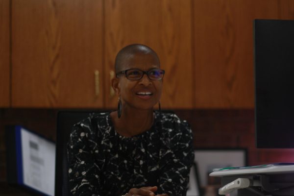 Fern Wagstaff talks with visitors at the
administrative office. Wagstaff works with Superintendent Jim Wipke. “Someone has called me his
boss, but I just manage his calendar which sometimes is a big job in itself,” Wagstaff said.