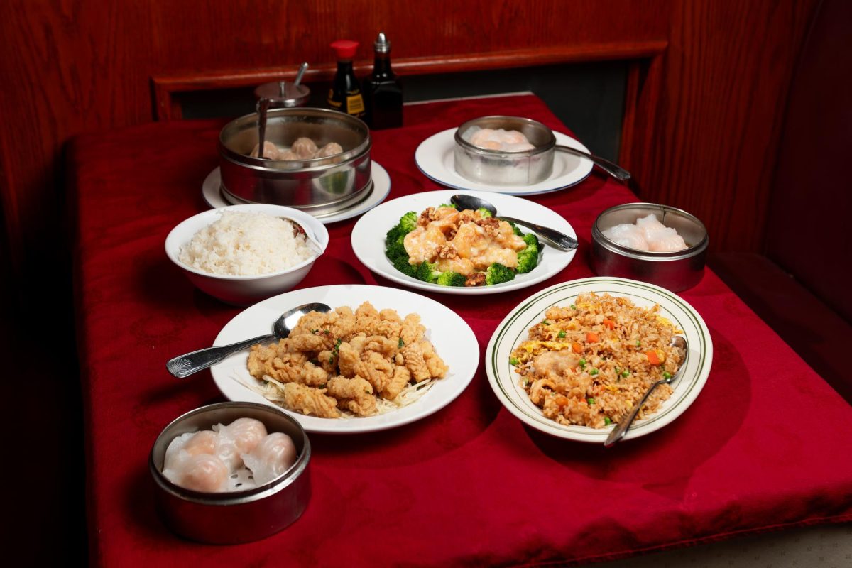 Five popular dishes from Lulus Seafood and Dimsum are displayed on one of their many tables in the restaurant. The restaurant employees worked very hard to produce such high quality, delicious food. “We have a more traditional menu with Dim Sum, Cantonese style, and Chinese style food,” restaurant co-founder Jerry Li said. “All the food is special to me, and our most unique aspect of the restaurant is Dim Sum.”