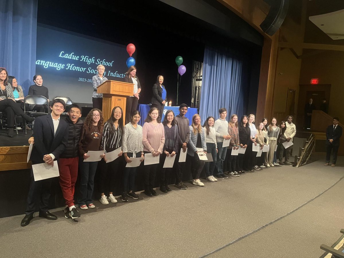 French Honor Society students line up to take a photo commemorating their induction. To attain this achievement, students had to apply and prove their dedication to the language by taking a French 3 class or higher (French 4 or AP).
