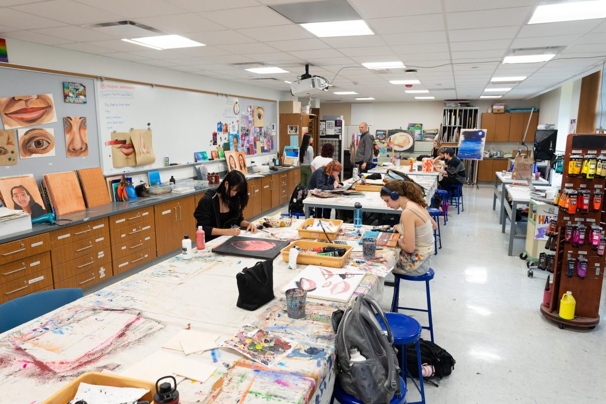 The AP Studio Art class works on independent projects Nov. 30. Each student chooses an overall theme for their work and develops a portfolio for submission to the College Board in May. “We can use whatever mediums we want, whether it’s painting, or drawing, or fibers, mixed media collage, clay [or] sculpture,” Esmé Roberts (12) said. “I think it’s interesting to see what people come up with to express themselves.”