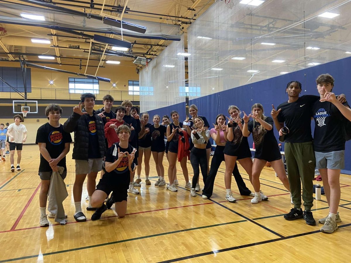 The Cheataz and BKE took a group photo after their JCC basketball game. Although they were disappointed in their loss, the Cheataz still celebrate with their friends. “It was a really fun game,” Avi Levin (11) said. “I can’t wait for the next one.” 