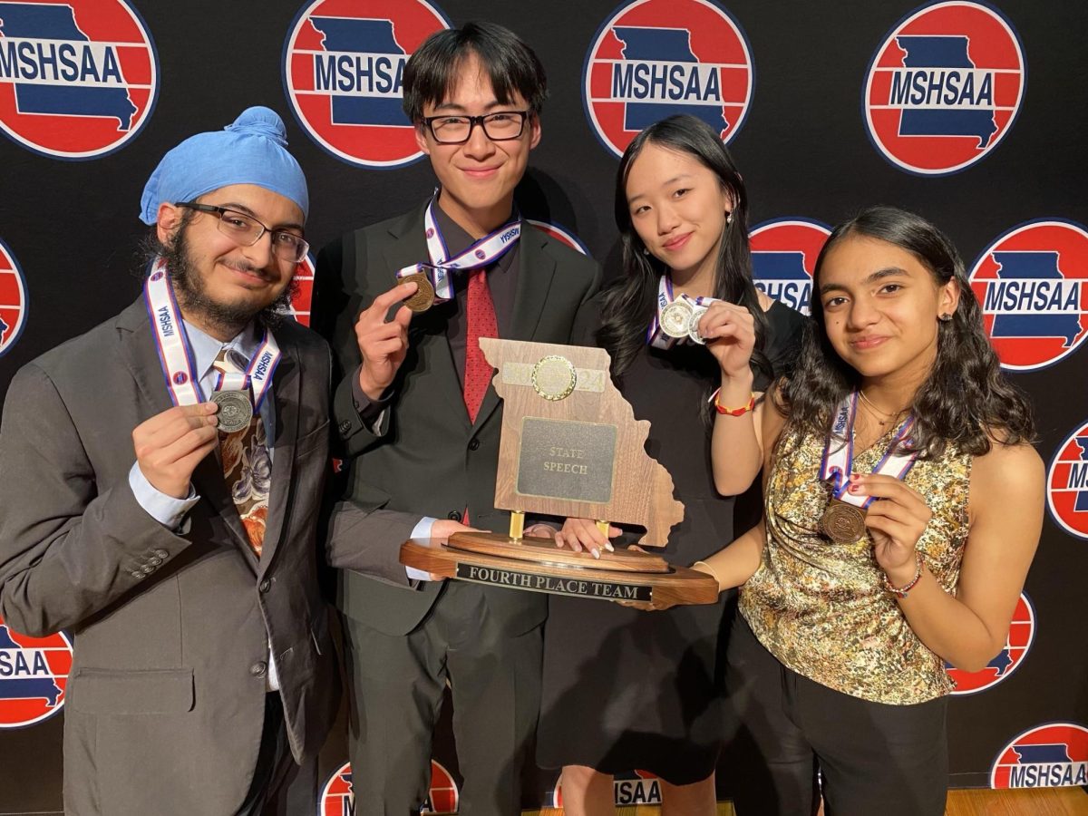 Debate team members pose together holding their medals. Each of the four juniors contributed to their overall fourth-place finish in state speech. “Every [Ladue student] who competed in speech made the podium, Bohan Pan  (11) said.