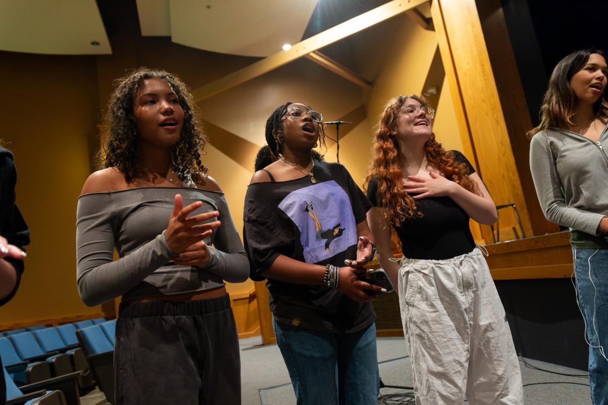 Adaeze Loynd (10), Khamari Davis (10), Kate Sheley (11) and Emma Bangert (11) warm up during their weekly rehearsal to prepare for their show. The show took place May 4 and the Viva Voce seniors took their final bow. “Every concert is always so fun because I get to do what I love, with people I love,” Loynd said. “But this show will be extra special since it’s our last spring concert with our seniors.” 