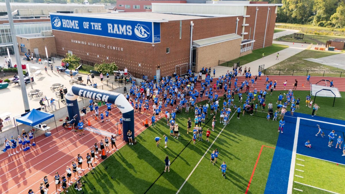 Ladue students, families and staff gathered at the McKenna Athletic Plaza and track for the 12th Annual ‘Due Run 4 Education, hosted by the Ladue Education Foundation, Saturday, Sept. 21. The ‘Due Run is a 5K and 1 mile run that fundraises the LEF nonprofit organization for their grants and initiatives that help further the academic opportunities for students across the district. Participant registration fees and dozens of corporate sponsors help contribute to an approximate total of $25,000 each year. LEF provided entertainment including a DJ, performances from the Laduettes and cheer team, gift card giveaways and food. Medals were awarded to the fastest runners in age groups. High school students in the National Honor Society chapter volunteered at the event as course monitors, photographers and mascots from each Ladue school. “It was pretty hot in those costumes, I was the [Conway] ram,” Garon Agrawal (12) said. “It got pretty hot, but it was a really fun experience. I loved giving all the kids high fives, and everyone’s really excited to see us mascots.”