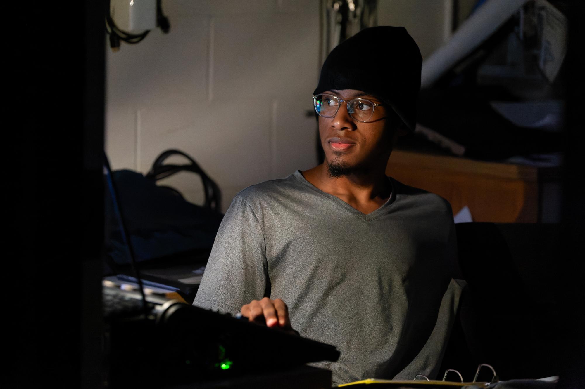 Kadan Brown (12) watches the Spring Senior Directed One Act rehearsals April 17 during his junior year. At first, Brown didn’t know anything about theater, but now Brown  is serving as Thespian Troupe 1109’s Head Lighting Director. “I’m actually not really sure [what made me interested in theater], I just kind of showed up one day and that day kind of solidified my place,” Brown said. “And I just stayed around.” 