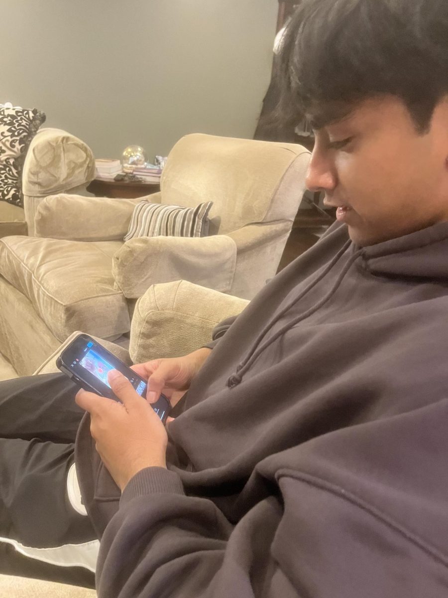 Agnihotri edits one of his TikTok vlogs at home. Creating videos, editing and overall running this account has been very important to him. “My First Amendment is important to me,” Agnihotri said. “[TikTok] has a lot of my memories, and same for other people." (photo courtesy of Agnihotri)