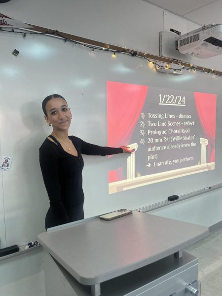 Nylah Saffold (11) presents her toast to the class. Saffold has taken AP Lang for the past semester. "I really enjoy the class and its environment," Saffold said.