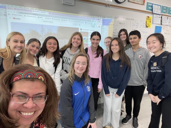 Members of SHA pose for a photo after the meeting. The club takes a picture after each meeting. "[The club] is open to everybody," said Taylor-Arnold. (Photo provided by Haydee Taylor-Arnold)