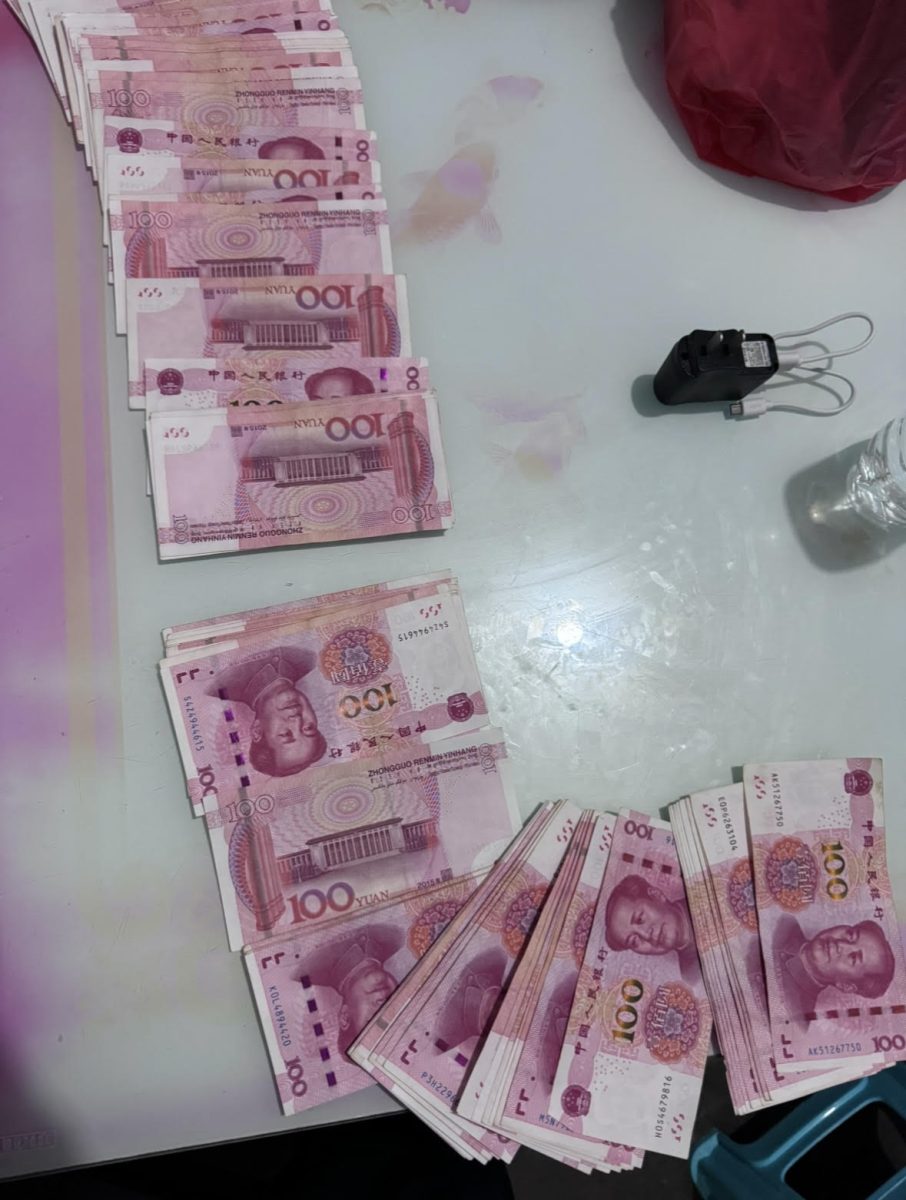 Kevin Wu (9) displays the money he received for Chinese New Year. Over the past six years, he has accumulated over ¥70,000, or about $10,000, from family members. "All that money was from COVID until the time I went back to China, so that was a total of six years," Wu said. "That was all the money from both sides of my family."