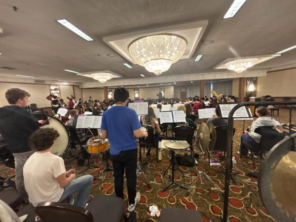 Band students rehearse a new piece. Several musicians performed at All-State over the past weekend. “After sectionals, there's usually an hour or a few before the first major rehearsals of the day,” Leung said. “[You] rinse and repeat the process of rehearsal, break, rehearsal, break." (photo courtesy of Kimmi Lin)